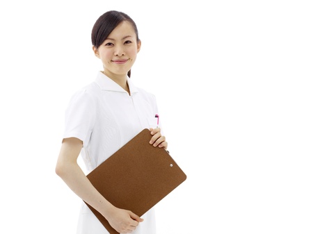 Smiling medical doctor or nurse. Isolated on white backgroundの写真素材