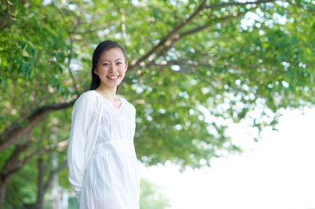 a portrait of young woman in the forestの写真素材