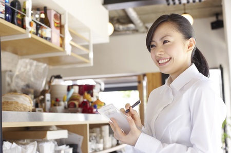 Service woman with a smileの写真素材