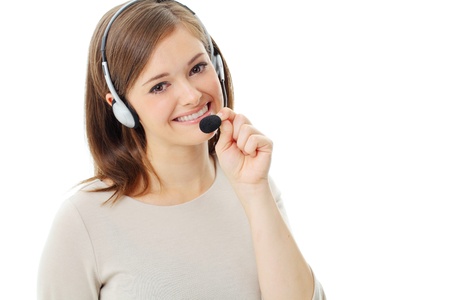 Portrait of happy smiling cheerful support phone operator in headset, isolated on white backgroundの写真素材