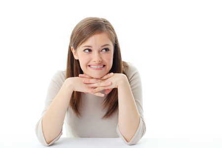 Portrait of smiling woman resting her chin on hand の写真素材