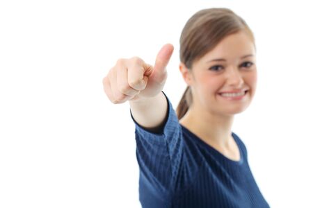 Portrait of smiling business woman showing thumbs up gesture on white backgroundの写真素材