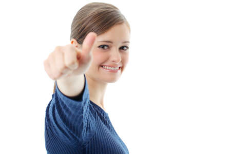 Portrait of smiling business woman showing thumbs up gesture on white backgroundの写真素材