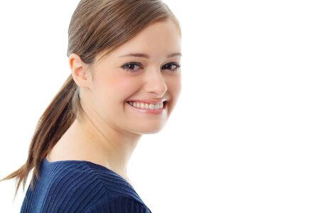 Beautiful casual young woman standing isolated against white backgroundの写真素材