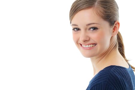 Beautiful casual young woman standing isolated against white backgroundの写真素材