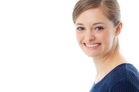 Beautiful casual young woman standing isolated against white backgroundの写真素材