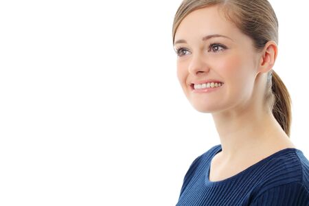 Beautiful casual young woman standing isolated against white backgroundの写真素材