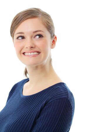 Beautiful casual young woman standing isolated against white backgroundの写真素材
