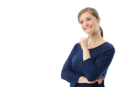Beautiful casual young woman standing isolated against white backgroundの写真素材