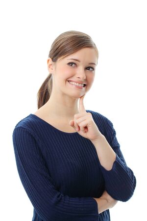 Beautiful casual young woman standing isolated against white backgroundの写真素材