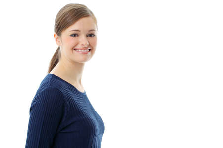 Beautiful casual young woman standing isolated against white backgroundの写真素材