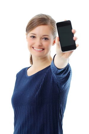 Young girl holding out mobile phoneの写真素材