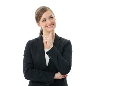 Portrait of a happy business woman lost in thoughtsの写真素材