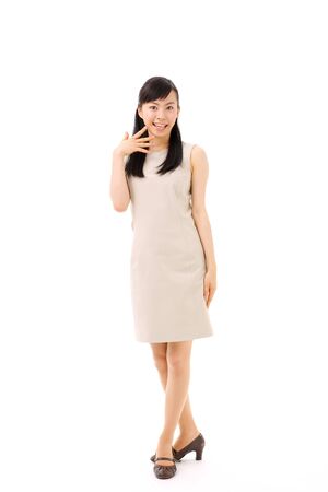 beautiful young girl introducing somethingの写真素材