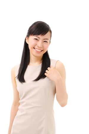 beautiful young girl introducing somethingの写真素材