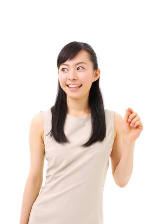 beautiful young girl introducing somethingの写真素材