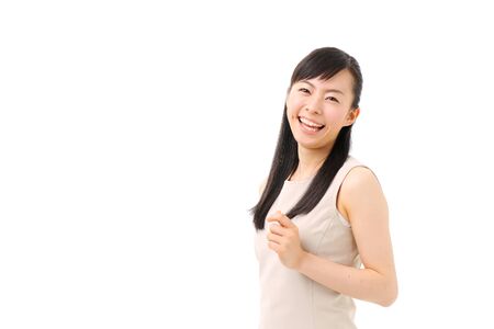 beautiful young girl introducing somethingの写真素材