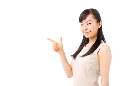 young girl introducing somethingの写真素材