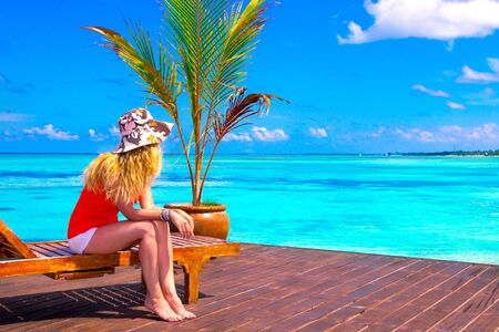 Escape the Dreamscape with beauty girl on Maldivesの写真素材