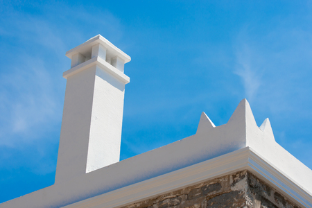 Chimney on a roofの写真素材