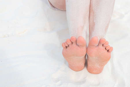 Feet on sandの写真素材