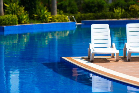 Sun chairs at the poolの写真素材