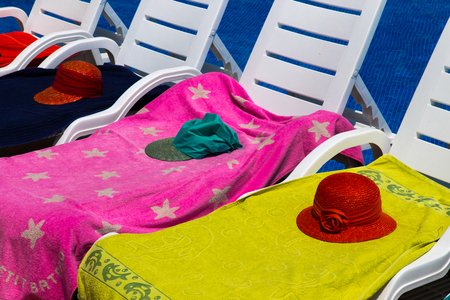 Sun chairs at the poolの写真素材