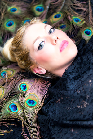 Close-up of blonde woman with blue eyesの写真素材