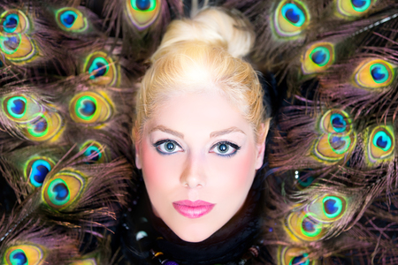 Close-up of blonde woman with blue eyesの写真素材