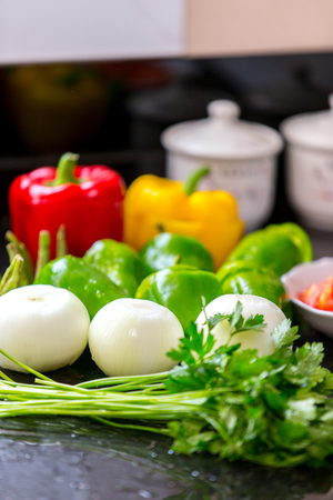 Peppers in the kitchenの写真素材