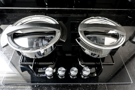 Two pots on the gas stoveの写真素材