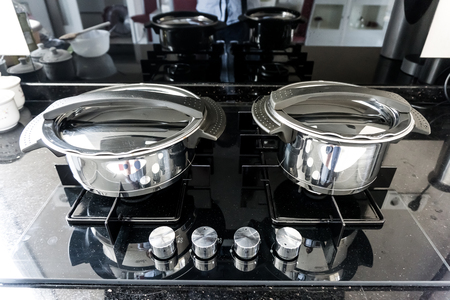 Two pots on the gas stove