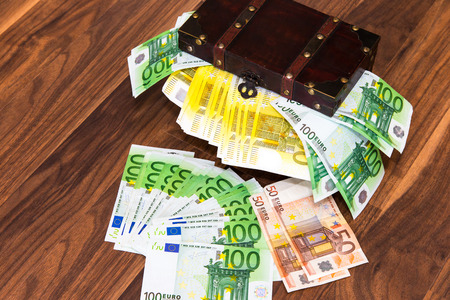 Bills in the wooden chestの写真素材