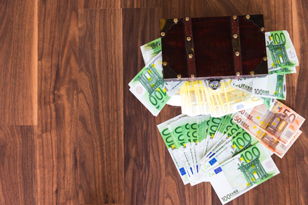 Bills in the wooden chestの写真素材