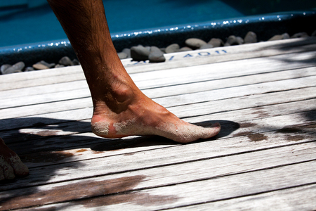 Feet on the woodenの写真素材