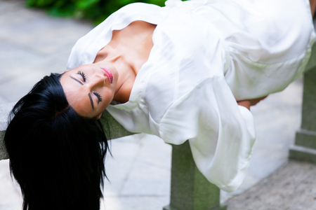 Pretty Woman in gardenの写真素材