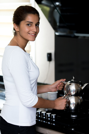 Girl in the kitchenの写真素材