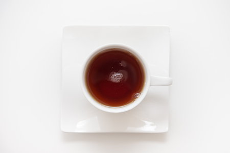Black tea in white Cupの写真素材