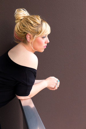 Blonde wife in the living roomの写真素材