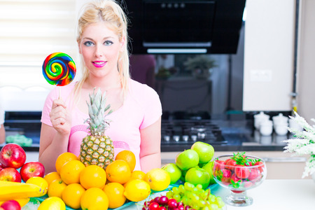 Pretty Woman in the kitchenの写真素材