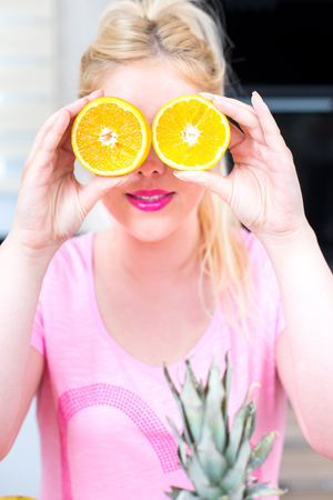 Pretty Woman in the kitchenの写真素材