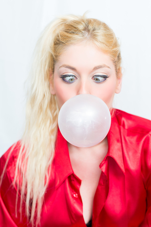 Blonde wife chews gumの写真素材