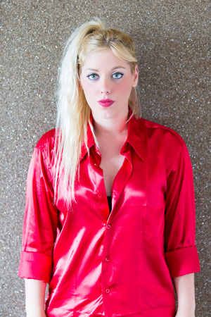 Blonde woman with bouquet of rosesの写真素材