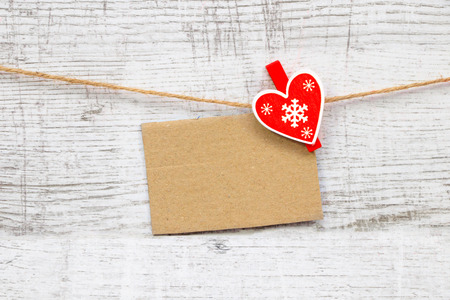 Note paper and small red heartの写真素材