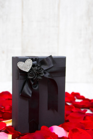 Surprise gift boxes on rose petals, valentines dayの写真素材