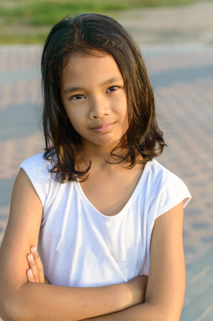 Close up portrait of a beautiful kid outdoor In The Evening.の写真素材