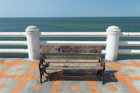 Wooden bench in the seaside at chonburi, thailand.の写真素材
