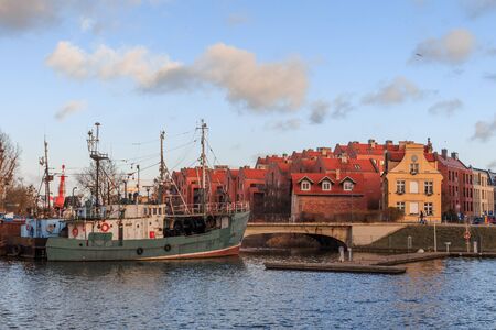 Gdansk city promenade in poland with beautiful old buildings and shipsの写真素材