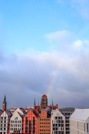 rainbow over the maria cathedral in gdansk top view in winter