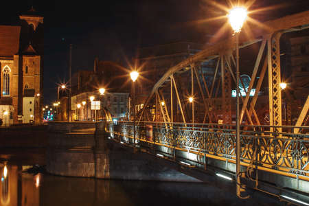 night view of the streets of the city of wroclaw with bridgesの写真素材